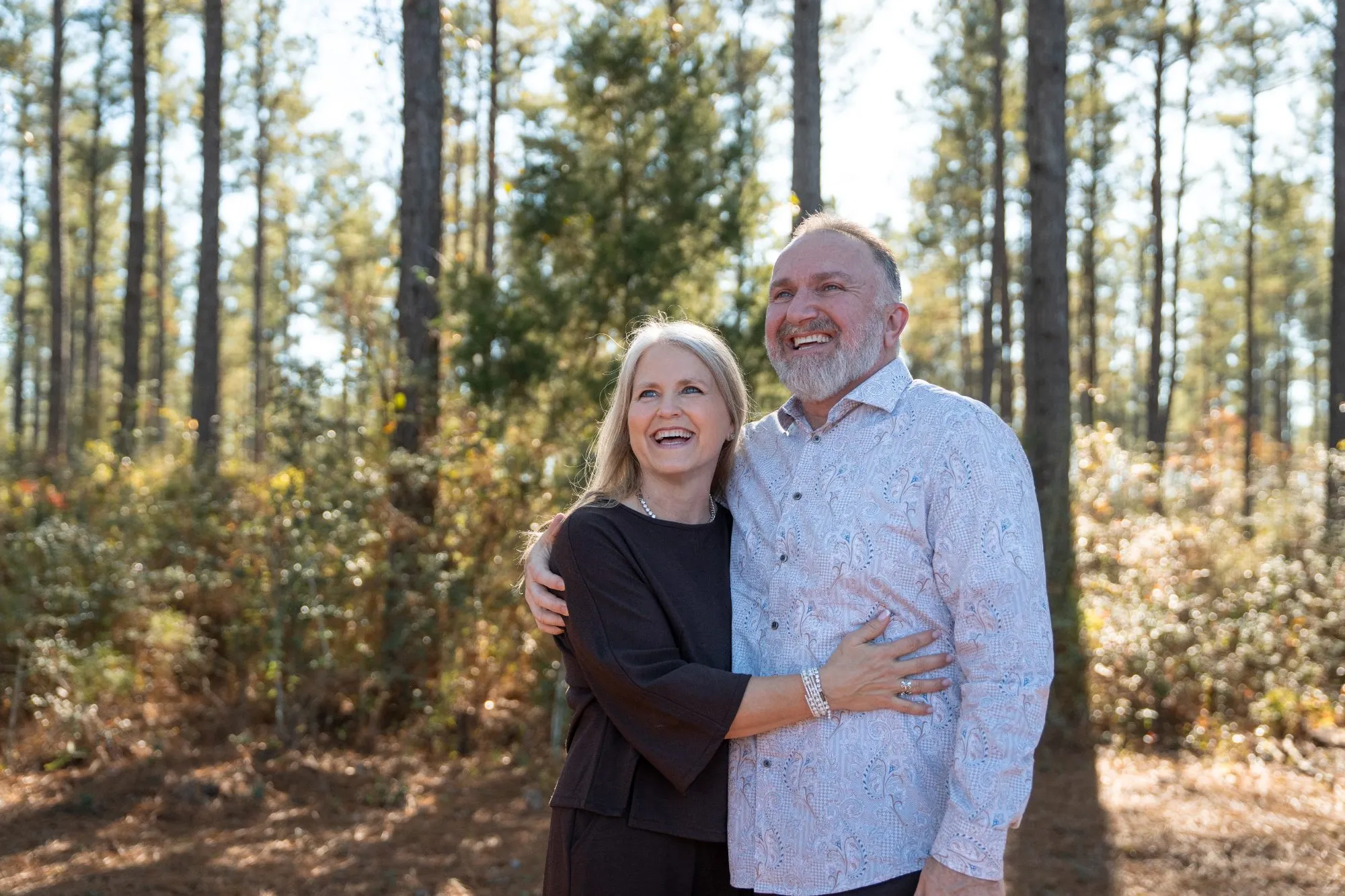 Drs. James and Cathie Hightshoe laughing together